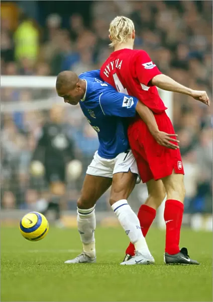 Marcus Bent shields the ball from Sami Hyypia