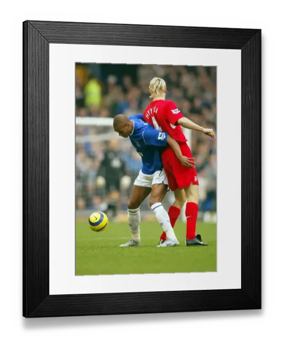 Framed Print : Marcus Bent shields the ball from Sami Hyypia Framed Print : Marcus Bent shields the ball from Sami Hyypia