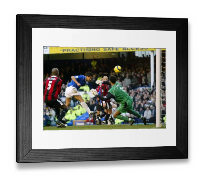 Framed Print : Tim Cahill heads home Framed Print : Tim Cahill heads home