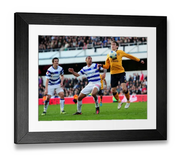 Framed Print : Battle for the Ball: Ferdinand vs. Jelavic - Everton vs. Queens Park Rangers, Premier League Clash (03 March 2012) Framed Print : Battle for the Ball: Ferdinand vs. Jelavic - Everton vs. Queens Park Rangers, Premier League Clash (03 March 2012)