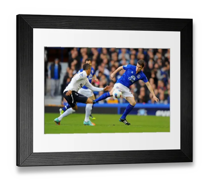 Framed Print : Battle at Goodison Park: Coleman vs. Walker - Everton vs. Tottenham Hotspur Premier League Clash (10 March 2012)