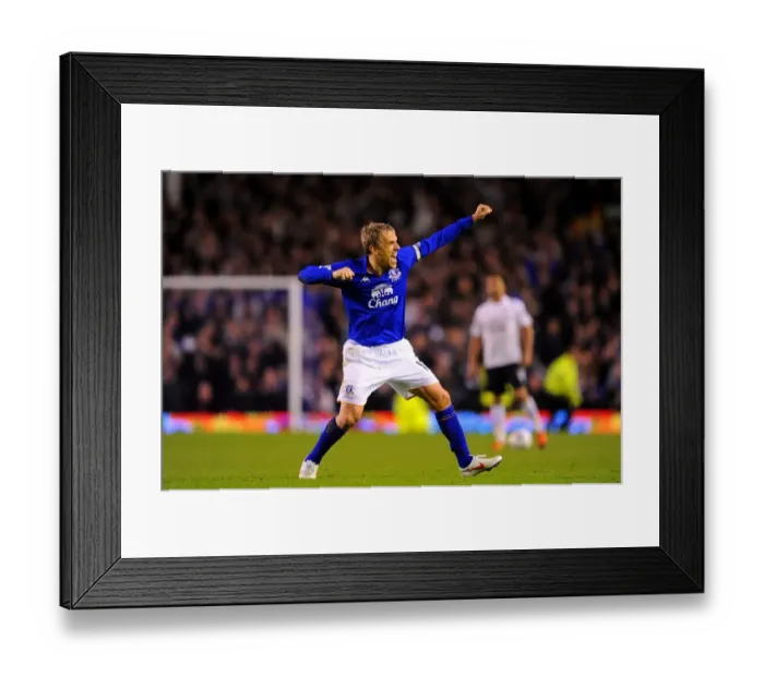 Framed Print : Euphoria at Goodison: Phil Neville's Triumphant Moment as Everton Defeats Tottenham Hotspur in the Barclays Premier League (10 March 2012) Framed Print : Euphoria at Goodison: Phil Neville's Triumphant Moment as Everton Defeats Tottenham Hotspur in the Barclays Premier League (10 March 2012)