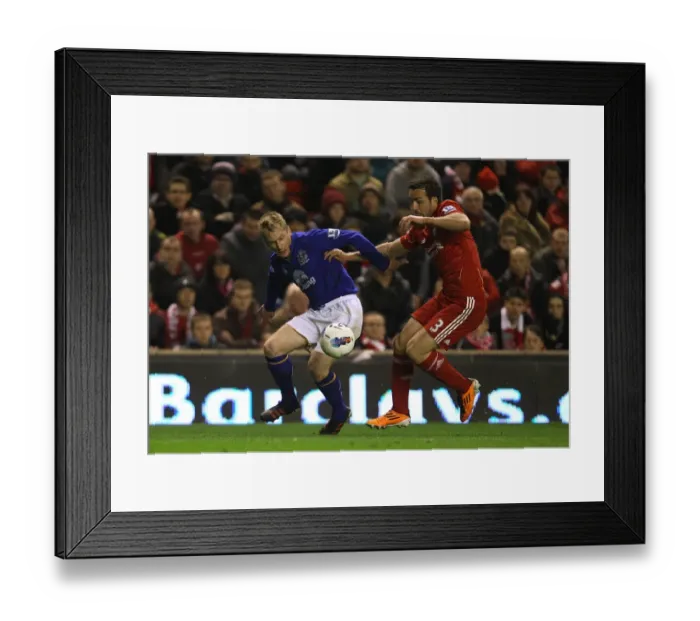 Framed Print : Intense Rivalry: Hibbert vs Enrique - Premier League Clash: Everton vs Liverpool (13 March 2012) Framed Print : Intense Rivalry: Hibbert vs Enrique - Premier League Clash: Everton vs Liverpool (13 March 2012)