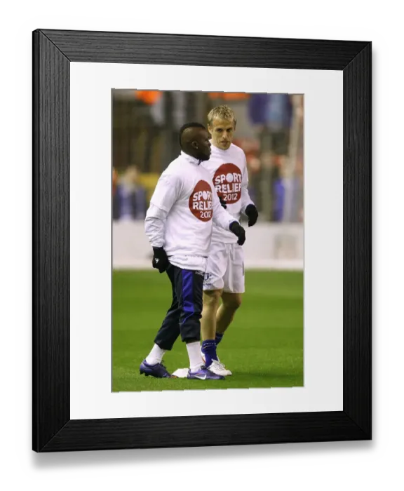 Framed Print : Everton's Drenthe and Neville: A Pre-Match Chat at Anfield Framed Print : Everton's Drenthe and Neville: A Pre-Match Chat at Anfield