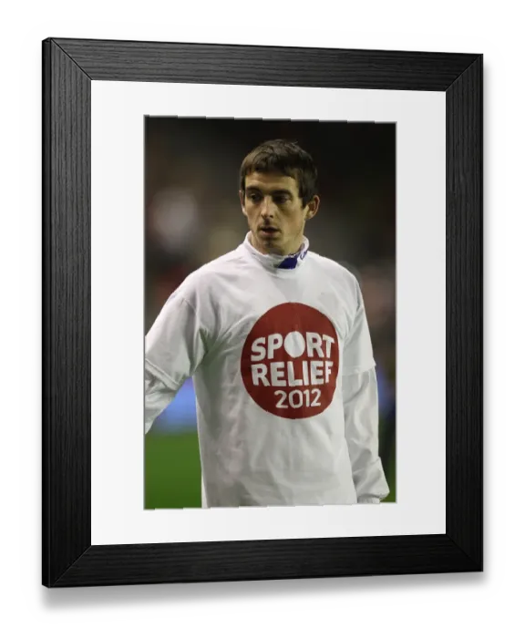 Framed Print : Everton's Leighton Baines Goes Head-to-Head Against Liverpool at Anfield in Barclays Premier League Rivalry (13 March 2012) Framed Print : Everton's Leighton Baines Goes Head-to-Head Against Liverpool at Anfield in Barclays Premier League Rivalry (13 March 2012)