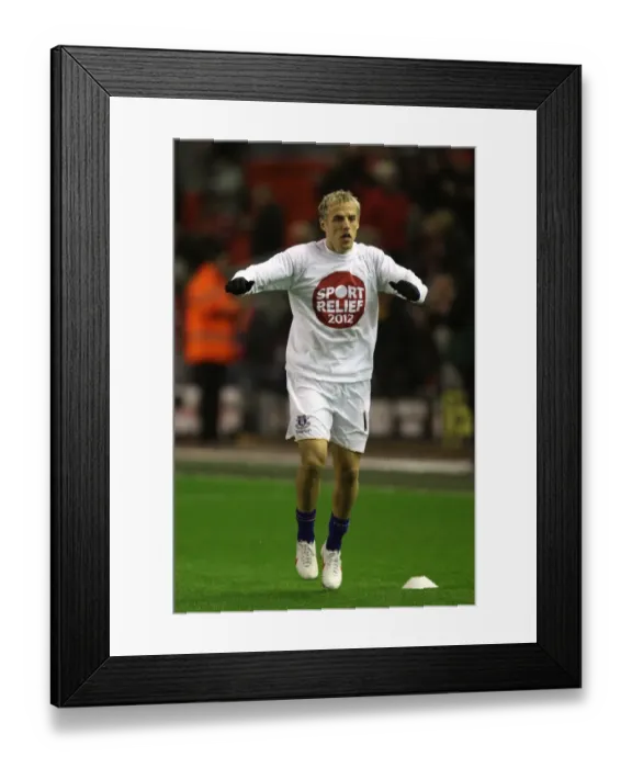 Framed Print : Phil Neville: Everton vs. Liverpool Rivalry at Anfield, Barclays Premier League (13 March 2012)