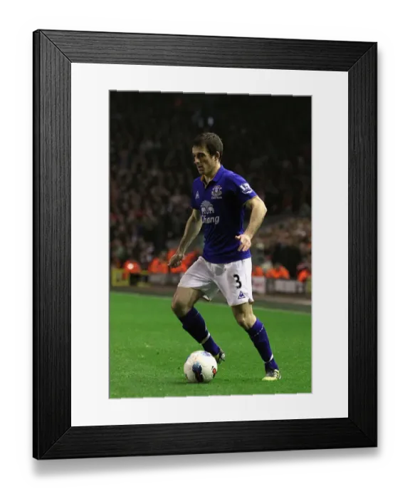 Framed Print : Intense Rivalry: Leighton Baines vs. Liverpool at Anfield (BPL Clash, 13 March 2012) Framed Print : Intense Rivalry: Leighton Baines vs. Liverpool at Anfield (BPL Clash, 13 March 2012)