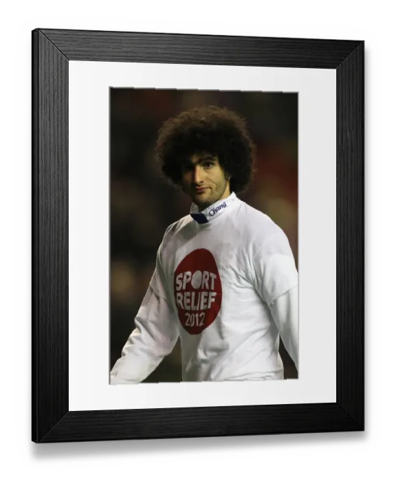 Framed Print : Marouane Fellaini: Everton's Unyielding Presence in the Premier League Showdown at Anfield (13 March 2012)