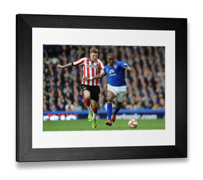Framed Print : Intense Battle for FA Cup Possession: Bendtner vs. Distin at Goodison Park (Everton vs. Sunderland, 17 March 2012) Framed Print : Intense Battle for FA Cup Possession: Bendtner vs. Distin at Goodison Park (Everton vs. Sunderland, 17 March 2012)