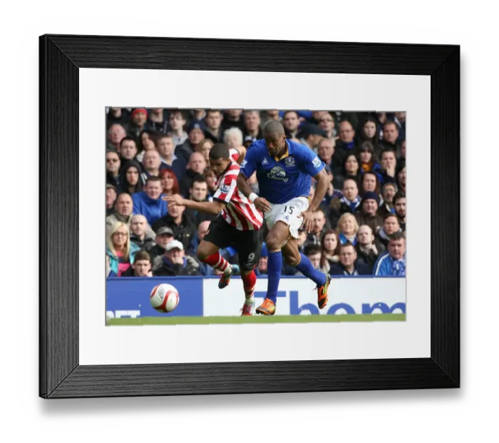 Framed Print : Distin Outmuscles Campbell: Everton's FA Cup Victory Over Sunderland (Round 6, 2012) Framed Print : Distin Outmuscles Campbell: Everton's FA Cup Victory Over Sunderland (Round 6, 2012)