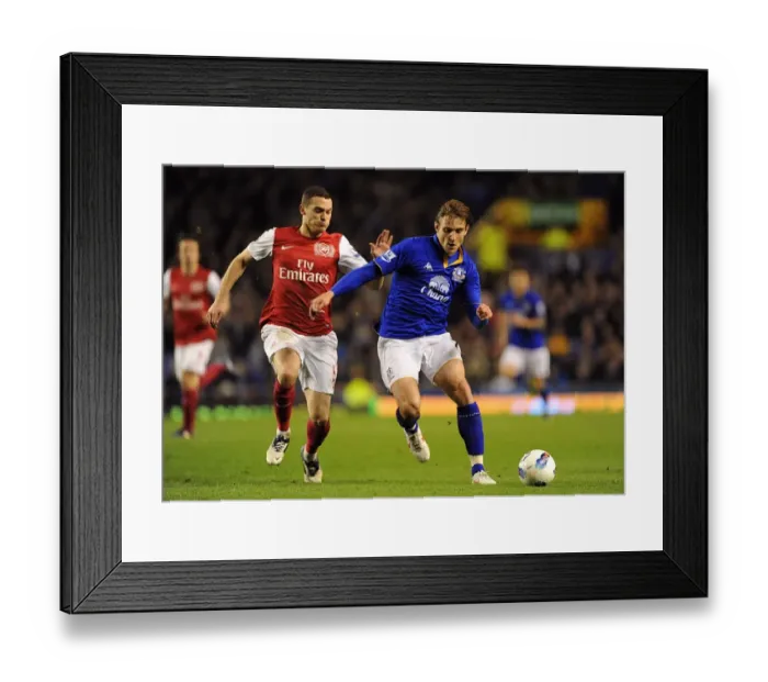 Framed Print : Battle for the Ball: Vermaelen vs. Jelavic - Everton vs. Arsenal, Premier League Rivalry (21 March 2012) Framed Print : Battle for the Ball: Vermaelen vs. Jelavic - Everton vs. Arsenal, Premier League Rivalry (21 March 2012)