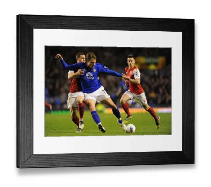 Framed Print : Vermaelen vs. Jelavic: A Premier League Rivalry Clash at Goodison Park (March 21, 2012) Framed Print : Vermaelen vs. Jelavic: A Premier League Rivalry Clash at Goodison Park (March 21, 2012)