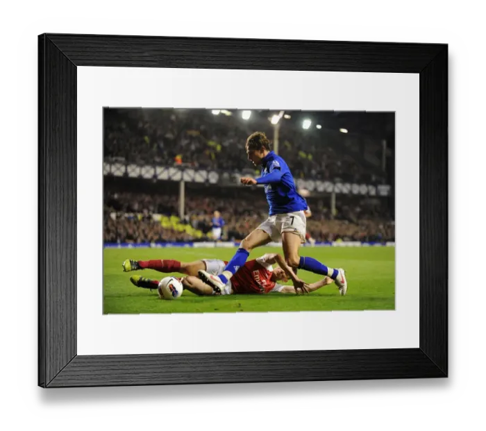 Framed Print : Battle for the Ball: Jelavic vs. Koscielny - Everton vs. Arsenal, Premier League Rivalry (21 March 2012) Framed Print : Battle for the Ball: Jelavic vs. Koscielny - Everton vs. Arsenal, Premier League Rivalry (21 March 2012)