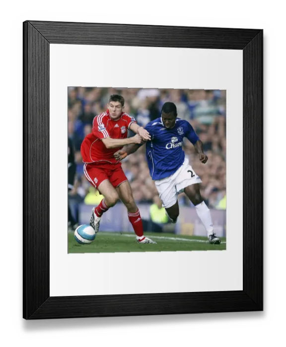 Framed Print : Gerrard vs Yakubu: A Football Rivalry Unfolds - Everton vs Liverpool at Goodison Park (2007) Framed Print : Gerrard vs Yakubu: A Football Rivalry Unfolds - Everton vs Liverpool at Goodison Park (2007)