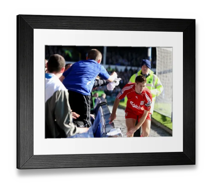 Framed Print : Steven Gerrard Charges Towards Everton Fans: The Intense Moment at Goodison Park During the Everton vs. Liverpool Derby (2007) Framed Print : Steven Gerrard Charges Towards Everton Fans: The Intense Moment at Goodison Park During the Everton vs. Liverpool Derby (2007)