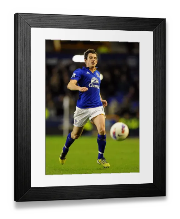 Framed Print : Barclays Premier League Showdown: Everton vs Arsenal at Goodison Park - Leighton Baines in Action Framed Print : Barclays Premier League Showdown: Everton vs Arsenal at Goodison Park - Leighton Baines in Action