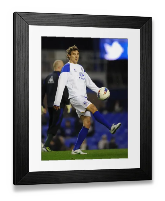 Framed Print : Dramatic Last-Minute Victory: Nikica Jelavic Scores for Everton Against Arsenal in BPL 2012 (21 March) Framed Print : Dramatic Last-Minute Victory: Nikica Jelavic Scores for Everton Against Arsenal in BPL 2012 (21 March)