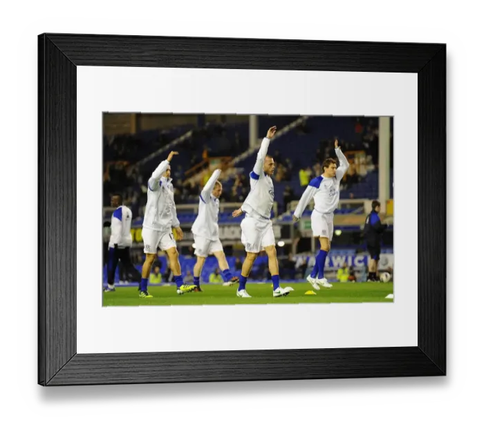 Framed Print : Everton FC: Gearing Up for the Battle at Goodison Park - Pre-Match Warm-Up vs. Arsenal (Premier League 2012)