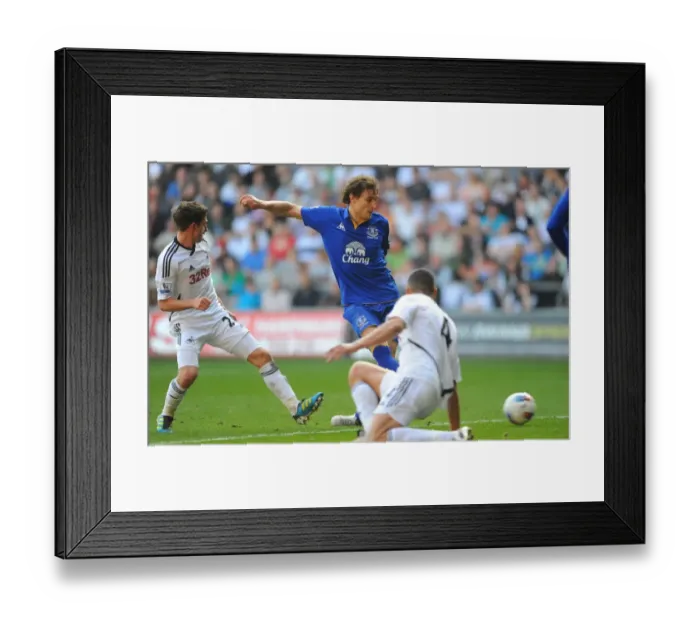 Framed Print : Jelavic Scores Everton's Second Goal Against Swansea City in Barclays Premier League (24 March 2012) Framed Print : Jelavic Scores Everton's Second Goal Against Swansea City in Barclays Premier League (24 March 2012)