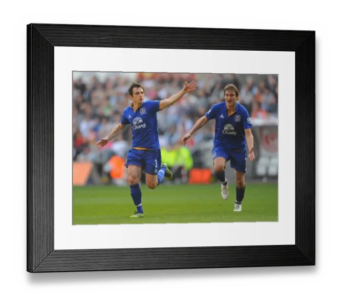 Framed Print : Everton's Baines and Jelavic: Unforgettable Goal Celebration vs. Swansea City (March 24, 2012) Framed Print : Everton's Baines and Jelavic: Unforgettable Goal Celebration vs. Swansea City (March 24, 2012)