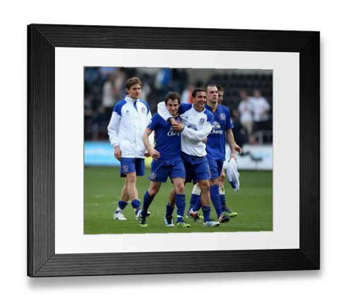 Framed Print : Everton's Triumphant Quartet: Tim Cahill, Nikica Jelavic, Darron Gibson, and Leighton Baines Celebrate Victory over Swansea City (24 March 2012) Framed Print : Everton's Triumphant Quartet: Tim Cahill, Nikica Jelavic, Darron Gibson, and Leighton Baines Celebrate Victory over Swansea City (24 March 2012)