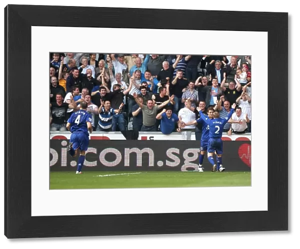 Everton's Jelavic and Hibbert: Celebrating a Memorable Second Goal Against Swansea City (24 March 2012)