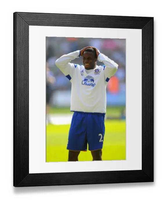 Framed Print : Victor Anichebe's Smile in Everton's Warm-Up Before Swansea City Clash (24 March 2012)