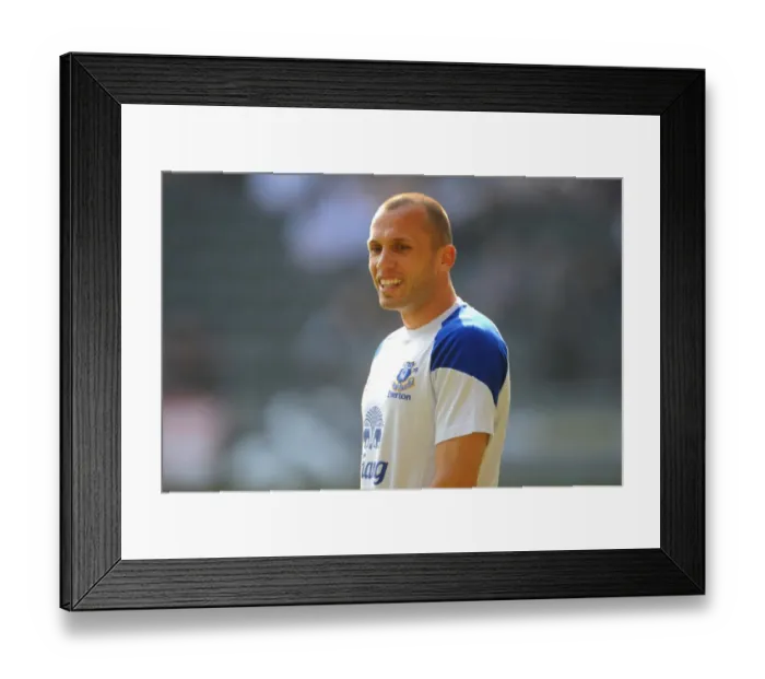 Framed Print : John Heitinga Faces Off Against Swansea City at Liberty Stadium during Everton's Barclays Premier League Clash (24 March 2012) Framed Print : John Heitinga Faces Off Against Swansea City at Liberty Stadium during Everton's Barclays Premier League Clash (24 March 2012)