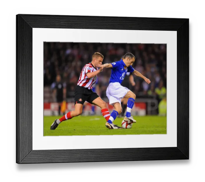 Framed Print : FA Cup Sixth Round Replay: Intense Battle Between Lee Cattermole and Leon Osman at Sunderland's Stadium of Light