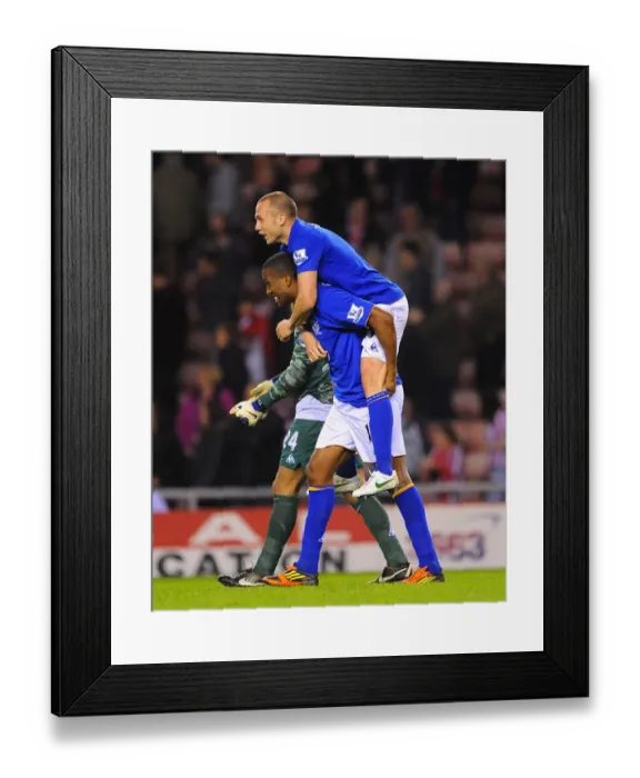 Framed Print : Everton's FA Cup Triumph: Heitinga and Distin's Jubilant Moment at Sunderland's Stadium of Light (March 2012) Framed Print : Everton's FA Cup Triumph: Heitinga and Distin's Jubilant Moment at Sunderland's Stadium of Light (March 2012)