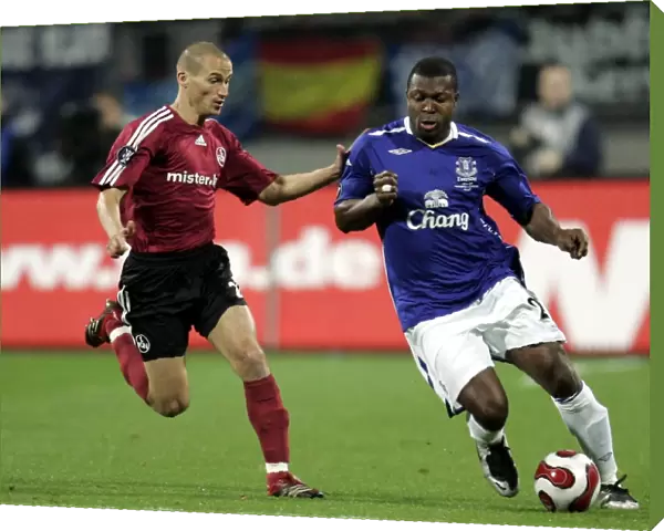 Football - FC Nurnberg v Everton UEFA Cup Group Stage - Second Round Matchday Two Group A - EasyCredit-Stadion, Nurnberg, Germany - 8  /  11  /  07 Evertons Yakubu in action with Nurnbergs Peer Kluge (L) Mandatory Credit: Action Images  /  Keith