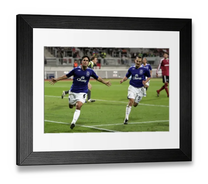 Framed Print : Mikel Arteta and Leon Osman's Goal Celebration: Everton's First Score Against FC Nurnberg in UEFA Cup Framed Print : Mikel Arteta and Leon Osman's Goal Celebration: Everton's First Score Against FC Nurnberg in UEFA Cup