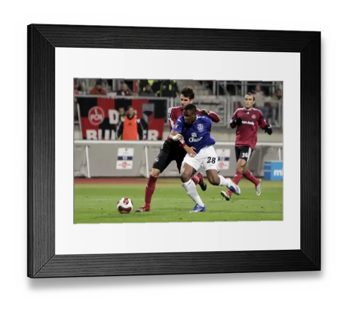 Framed Print : Anichebe Wins Controversial Penalty for Everton against Nurnberg in UEFA Cup Framed Print : Anichebe Wins Controversial Penalty for Everton against Nurnberg in UEFA Cup