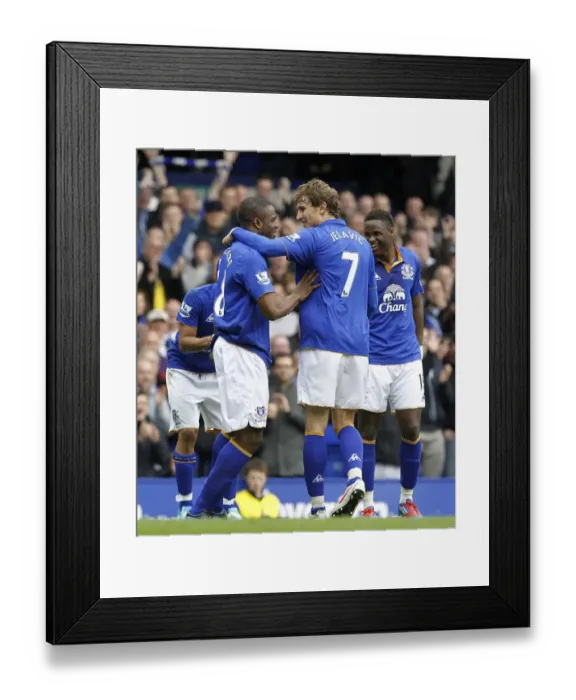 Framed Print : Everton's Double Trouble: Anichebe and Jelavic Celebrate Goals Against West Bromwich Albion (March 31, 2012) Framed Print : Everton's Double Trouble: Anichebe and Jelavic Celebrate Goals Against West Bromwich Albion (March 31, 2012)