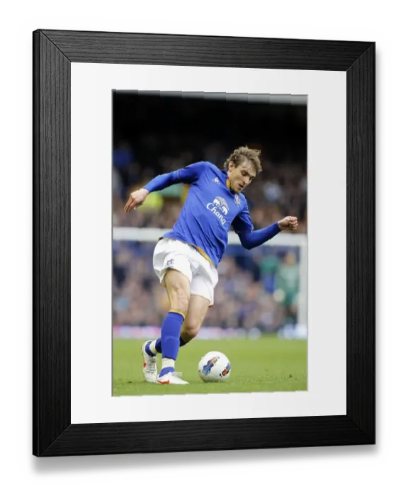 Framed Print : Dramatic Winner: Nikica Jelavic Scores Last-Minute Goal to Give Everton Victory Over West Bromwich Albion (March 31, 2012, Barclays Premier League)