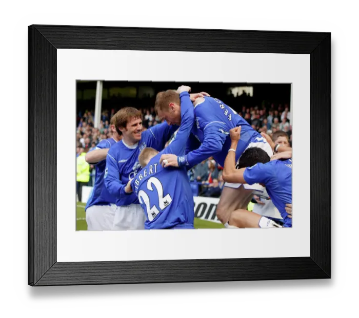 Framed Print : Duncan Ferguson is mobbed after his goal Framed Print : Duncan Ferguson is mobbed after his goal