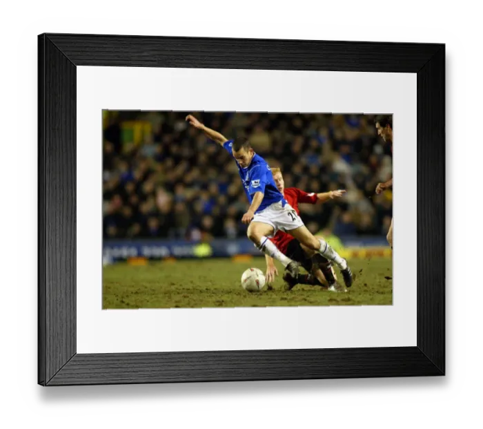 Framed Print : Leon Osman is fouled by Paul Scholes Framed Print : Leon Osman is fouled by Paul Scholes