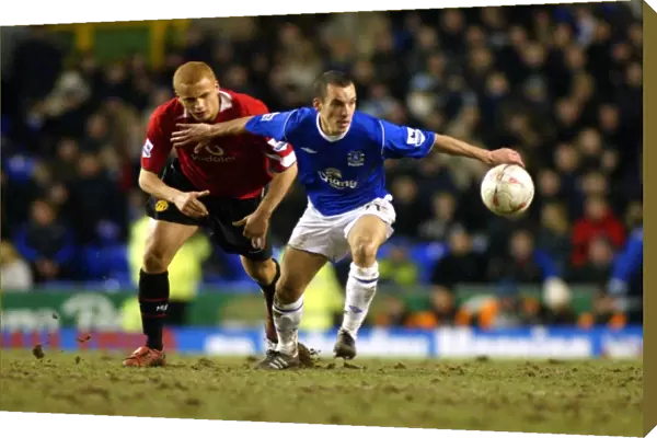 Leon Osman gets the better of Wes Brown