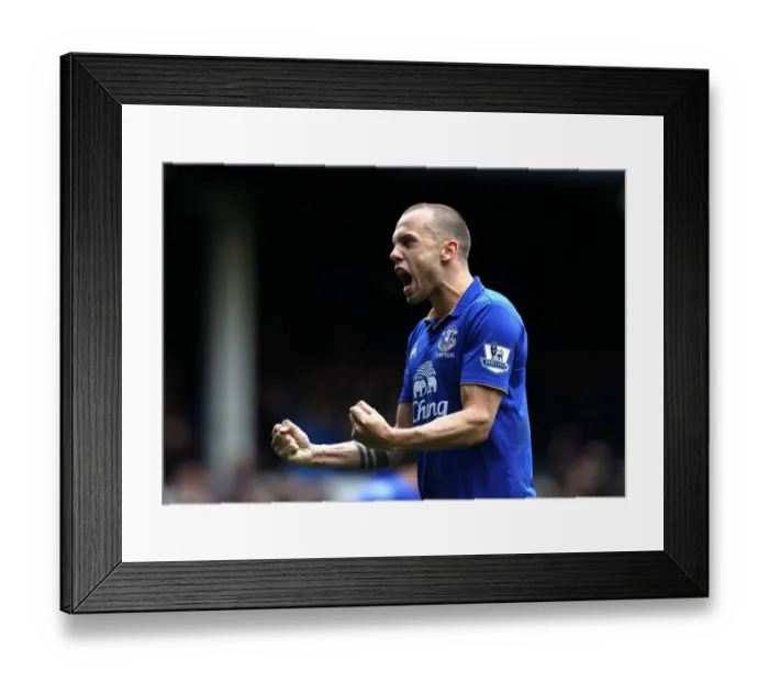 Framed Print : Everton's Glorious Four: Heitinga and Anichebe Celebrate Victory with Four Goals Against Sunderland (09.04.2012, Goodison Park) Framed Print : Everton's Glorious Four: Heitinga and Anichebe Celebrate Victory with Four Goals Against Sunderland (09.04.2012, Goodison Park)