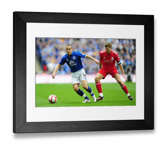 Framed Print : Everton's Leon Osman Outwits Liverpool's Steven Gerrard in FA Cup Semi-Final Clash at Wembley Stadium Framed Print : Everton's Leon Osman Outwits Liverpool's Steven Gerrard in FA Cup Semi-Final Clash at Wembley Stadium