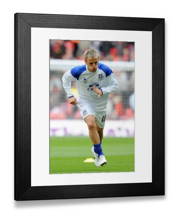 Framed Print : FA Cup Semi-Final: Phil Neville Leads Everton Against Liverpool at Wembley Stadium (April 14, 2012)