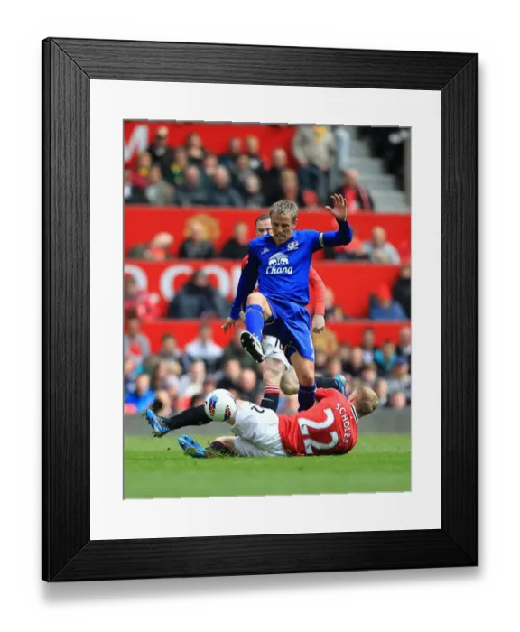 Framed Print : Battle for Supremacy: Neville vs. Scholes - Everton vs. Manchester United Rivalry Reignited (22 April 2012, Old Trafford)