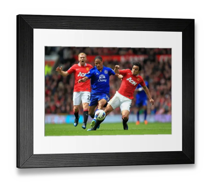Framed Print : Intense Battle for Ball Possession: Rafael Da Silva vs. Steven Pienaar (Manchester United vs. Everton, Barclays Premier League, Old Trafford, 22 April 2012)