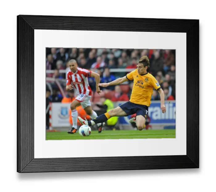 Framed Print : Everton's Jelavic in Thrilling Action: May 2012's EPL Clash vs Stoke City (Britannia Stadium) Framed Print : Everton's Jelavic in Thrilling Action: May 2012's EPL Clash vs Stoke City (Britannia Stadium)