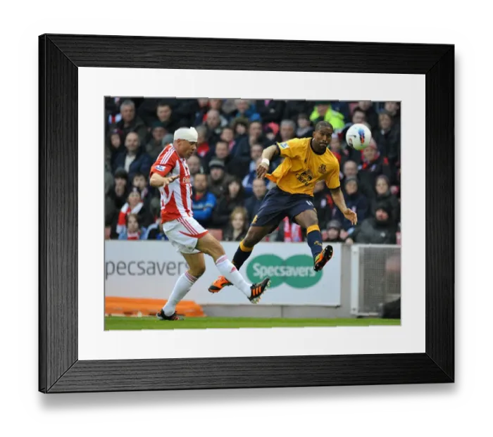 Framed Print : Intense Battle: Distin vs Walters at Britannia Stadium - Everton vs Stoke City, Premier League (01 May 2012) Framed Print : Intense Battle: Distin vs Walters at Britannia Stadium - Everton vs Stoke City, Premier League (01 May 2012)