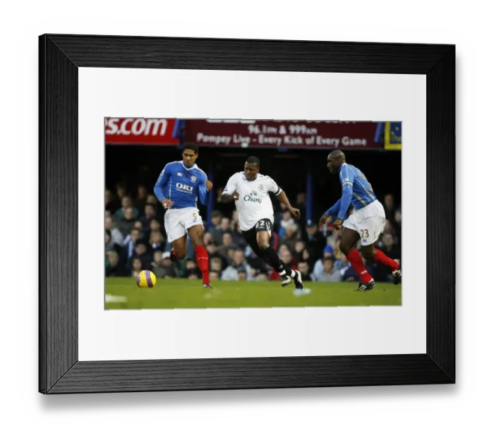 Framed Print : Determined Yakubu: Everton's Star Forward Faces Off Against Portsmouth's Defense, Barclays Premier League, 2007 Framed Print : Determined Yakubu: Everton's Star Forward Faces Off Against Portsmouth's Defense, Barclays Premier League, 2007