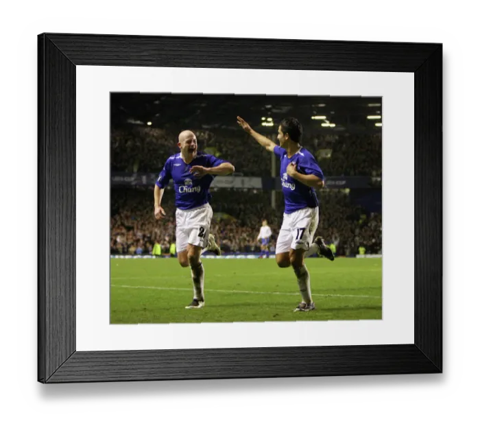 Framed Print : Tim Cahill's Thrilling Goal Celebration: Everton's Victory Against Zenit St. Petersburg in UEFA Cup Group Stage (2007) Framed Print : Tim Cahill's Thrilling Goal Celebration: Everton's Victory Against Zenit St. Petersburg in UEFA Cup Group Stage (2007)