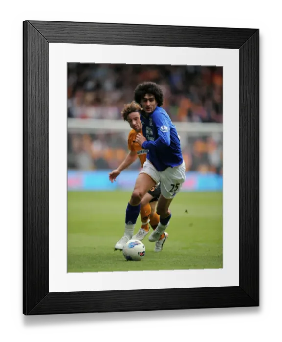 Framed Print : Fellaini vs. Ward: A Tense Battle Between Wolverhampton Wanderers and Everton in the Premier League (06 May 2012) Framed Print : Fellaini vs. Ward: A Tense Battle Between Wolverhampton Wanderers and Everton in the Premier League (06 May 2012)
