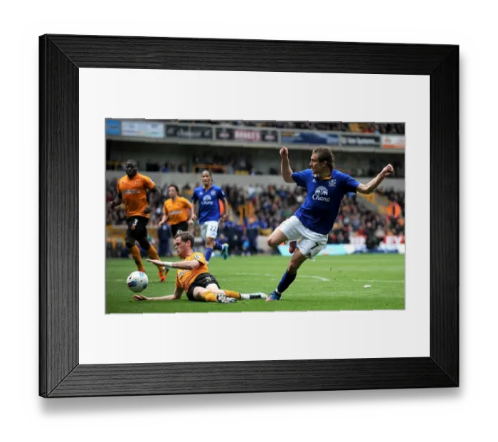 Framed Print : Thrilling Barclays Premier League Showdown: Everton's Jelavic Chases Victory at Molineux Stadium (06 May 2012) Framed Print : Thrilling Barclays Premier League Showdown: Everton's Jelavic Chases Victory at Molineux Stadium (06 May 2012)