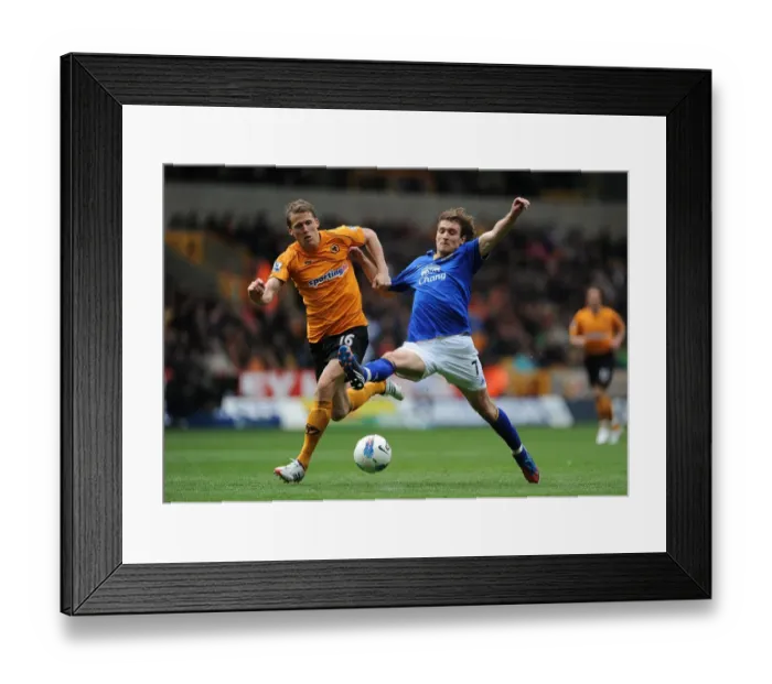 Framed Print : Clash at Molineux: Berra vs. Jelavic - Premier League Showdown between Wolverhampton Wanderers and Everton (06 May 2012) Framed Print : Clash at Molineux: Berra vs. Jelavic - Premier League Showdown between Wolverhampton Wanderers and Everton (06 May 2012)